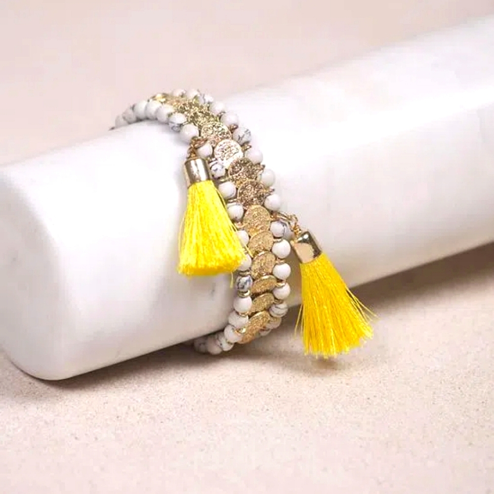 Rapsodia Bohemian Tassel and Coin elastic bracelet